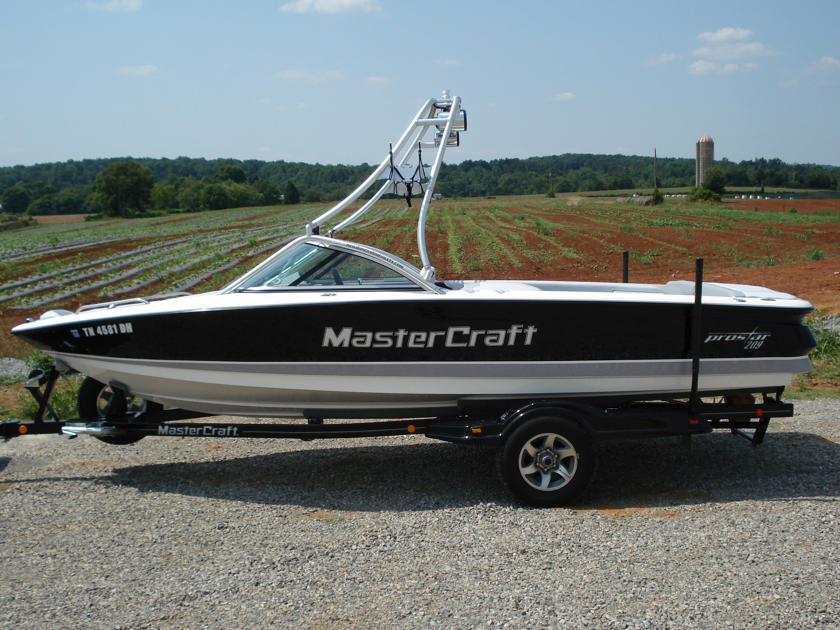 main view of 01 - 06 mastercraft prostar 209 wakeboard boat with new dimension wakeboard tower