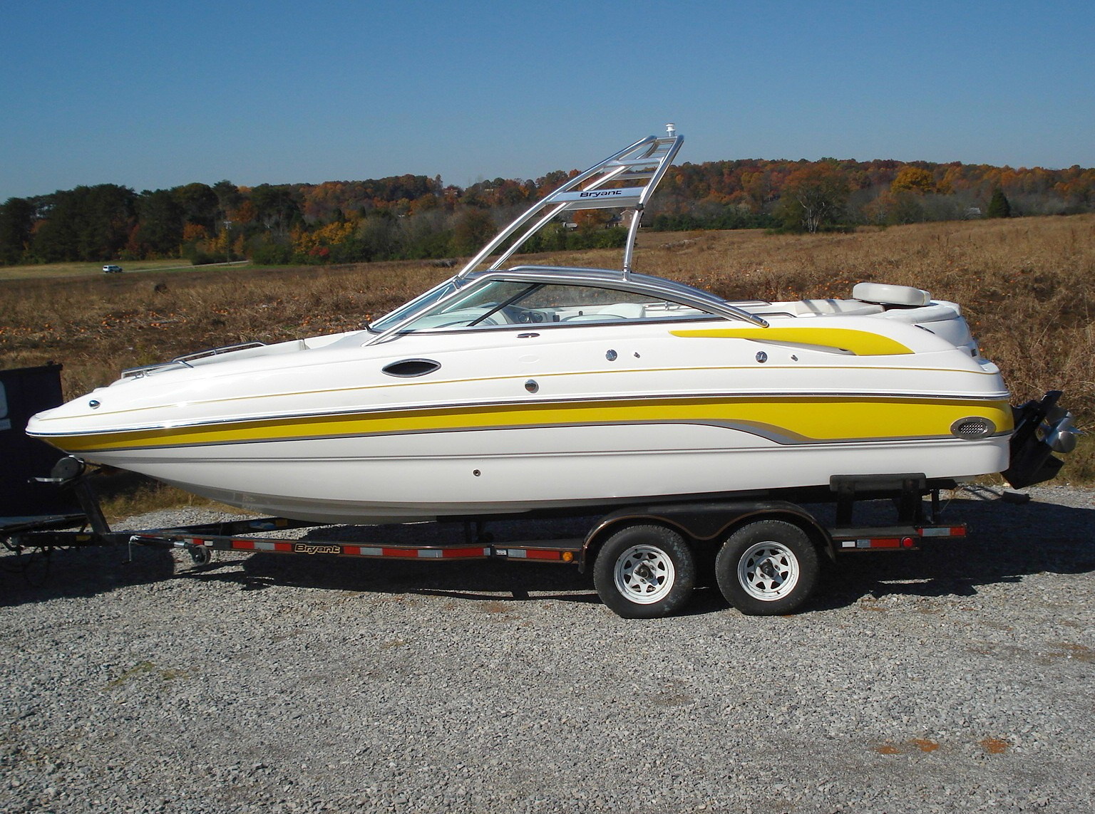 main image for 2006 bryant 236 wake boat with new diomension wakeboard tower